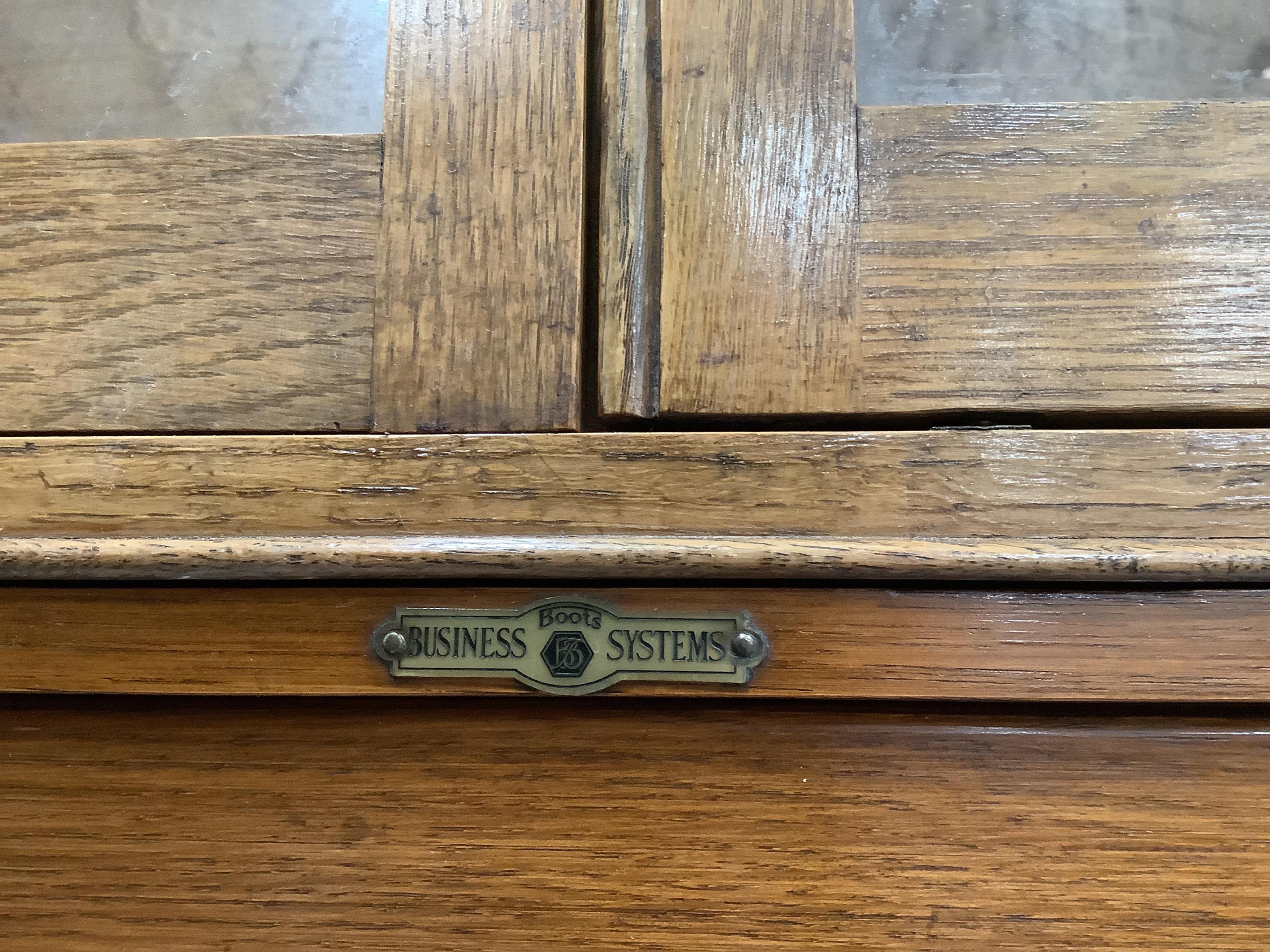 An early 20th century oak 'Business Book Systems' five section bookcase, width 86cm, depth 37cm, height 224cm